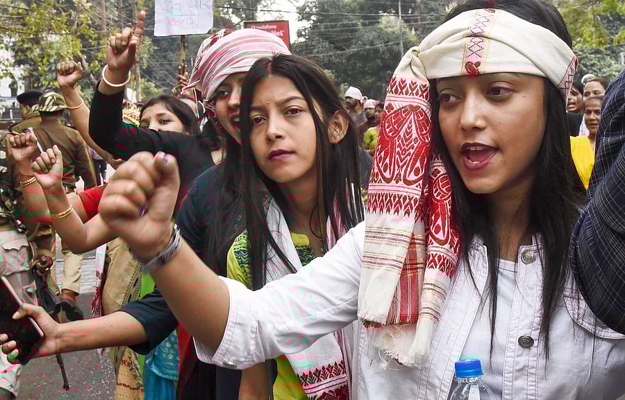 AASU supporters raise slogans during their ‘Gana Saityagrah’ protest against Citizenship Amendment Act, in Guwahati. (PTI Photo)