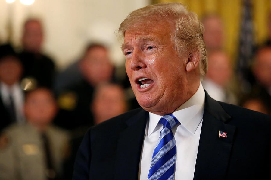 US President Donald Trump disparages the New York Times as he speaks following a meeting with sheriffs from across the country at the White House in Washington, September 5, 2018. (REUTERS)