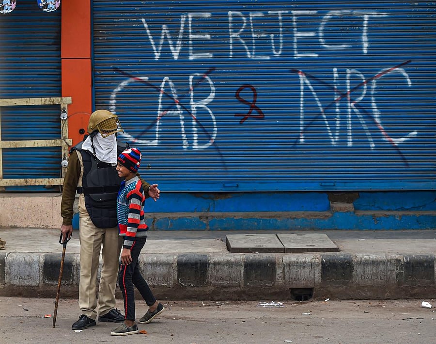 Earlier in the day, police and paramilitary personnel carried out a flag march in Seelampur and Sunder Nagri. Photo/PTI
