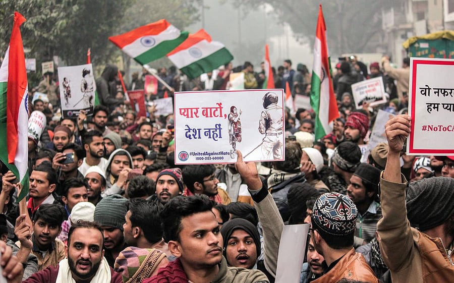 Protestors raise slogans during an anti-Citizenship Act protest. (PTI file photo)