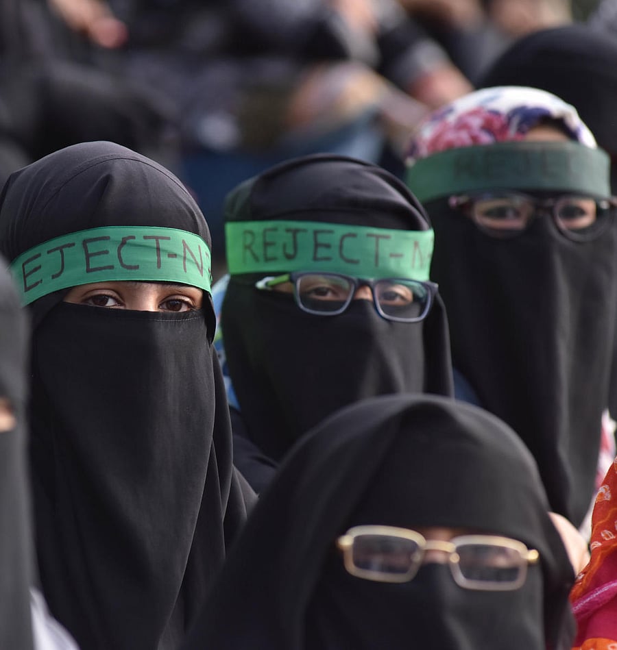 Women during an anti-CAA protest in front of Town Hall in Bengaluru on Saturday. DH PHOTO/JANARDHAN B K