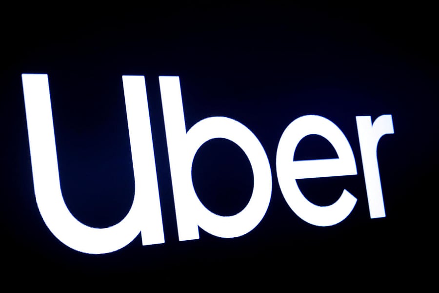 A screen displays the company logo for Uber Technologies Inc on the day of its IPO at the New York Stock Exchange (NYSE) in New York, U.S., May 10, 2019. (Reuters photo)