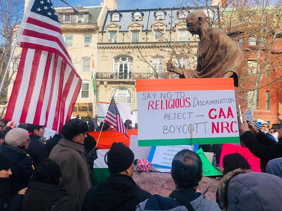 Organised by American-Indian Muslims in association with over a dozen of similar bodies, peaceful protestors from in and around the Greater Washington Area on Sunday shouted slogans in favour of India's unity and displayed posters and banners alleging that the country was headed in a direction that was not secular in nature and violated the ethos of the Constitution. Photo/Twitter (@RRemediator)