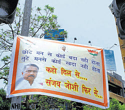 BJP banner in support of party leader Sanjay Joshi in Ahmedabad on Tuesday. PTI