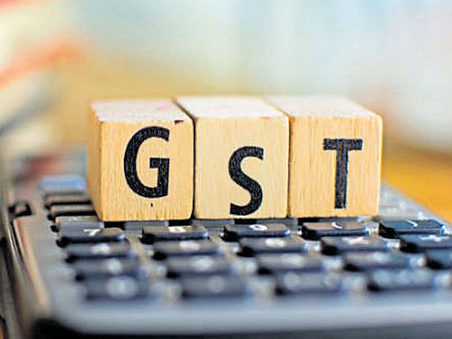 GST, it said, could reduce inefficiencies in the production process while eliminating the current compounding effect of different central and state levies. File Photo