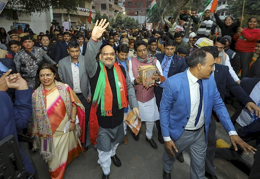 Union Home Minister Amit Shah during door -to- door campaign on CAA at Lajpat Nagar in New Delhi, Sunday, Jan. 5, 2020. Photo/PTI