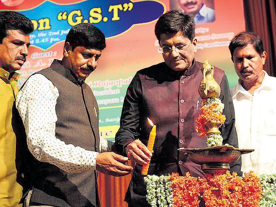 Union Minister for Energy Piyush Goyal inaugurates an interactive session on GST organised by the Byatarayanapura and Hebbal units of Bharatiya Janata Party (BJP) in Bengaluru on Sunday. Hebbal MLA Y A Narayanaswamy and other BJP leaders are seen.