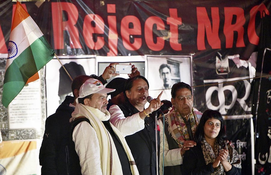 Congress MP Shashi Tharoor addresses during a protest against Citizenship (Amendment) Act, at Shaheen Bagh in New Delhi. (Credit: PTI)