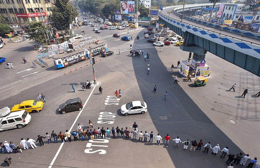 People from various communities form a human chain seeking 'protection of the Constitution of India', on the occasion of the 71st Republic Day, in Kolkata, Sunday, Jan. 26, 2020. (PTI Photo)