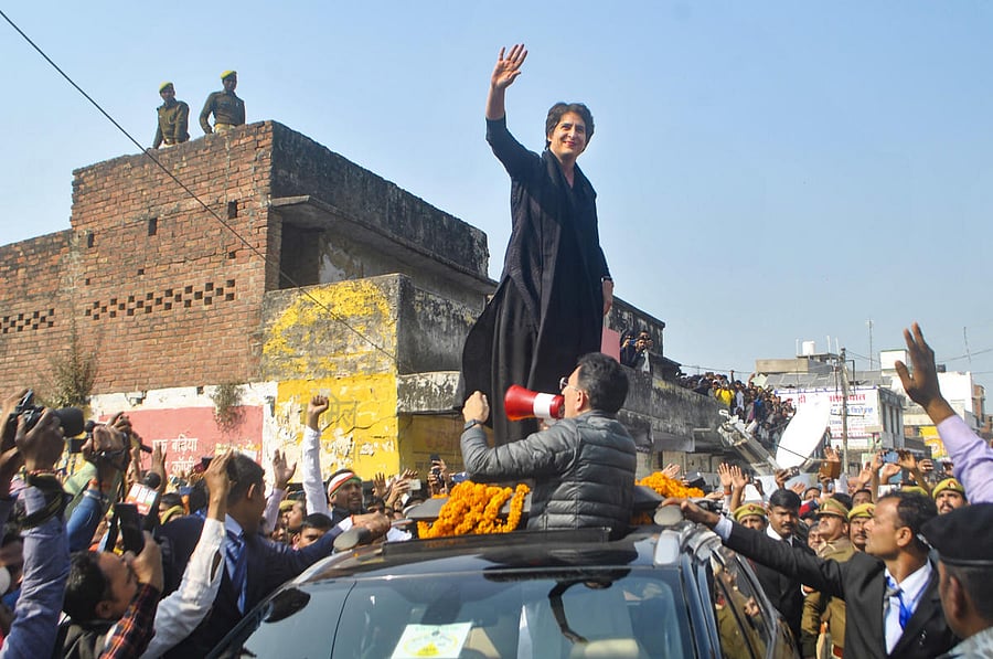 AICC General Secretary Priyanka Gandhi Vadra waves at supporters during her visit to Bilariyaganj in Azamgarh, Wednesday, Feb. 12, 2020 (PTI Photo)