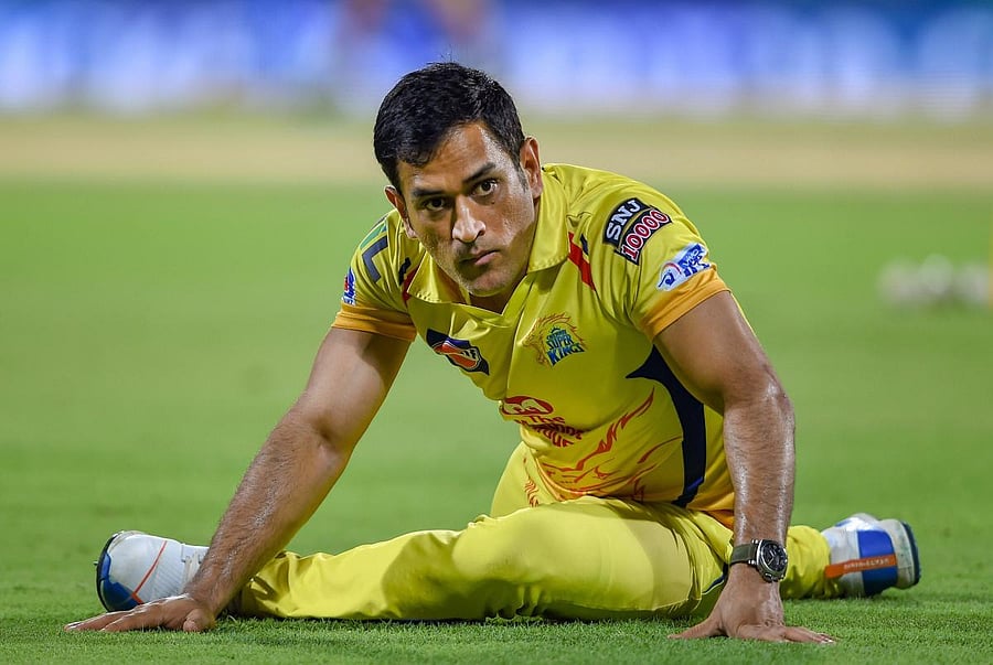 CSK skipper MS Dhoni stretches at the commence of the Indian Premier League 2019. (PTI Photo)