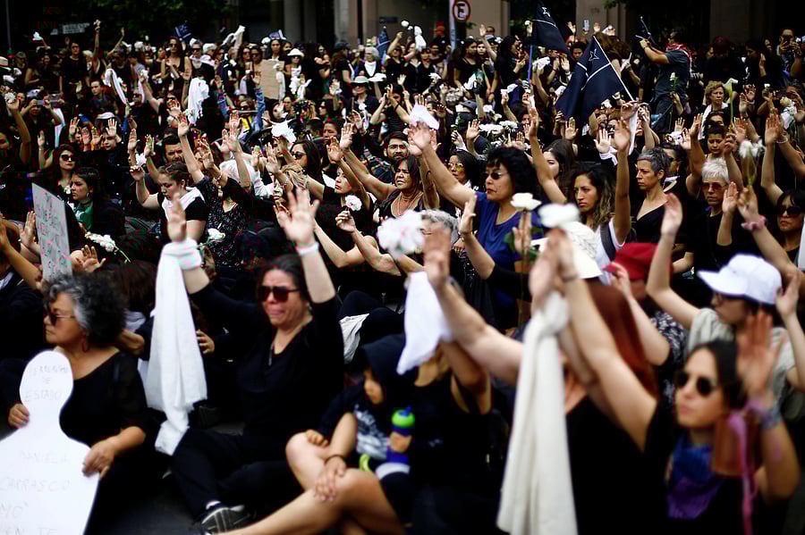 People participate in a demonstration to pay tribute to people killed during the protests against Chile's government, in Santiago, Chile. (Reuters Photo)