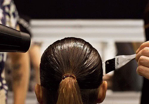 Women spend almost 10,000 pounds on hair colour