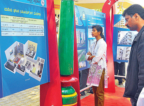 choice by chance: Visitors go through information on BDA properties at the inauguration of the lottery system in the City on Thursday. dh photo