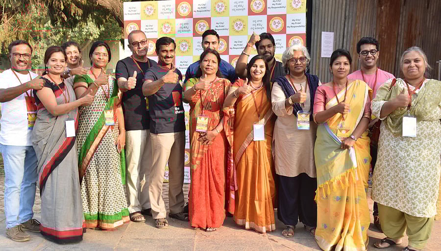 Srikanth Narasimhan, general secretary of Bengaluru Navanirmana Party, along with candidates for the BBMP polls at Freedom Park on Saturday. DH PHOTO/JANARDHAN B K