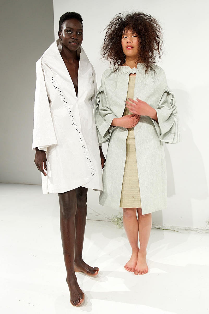 A model wears a japanese- inspired crossover jacket.