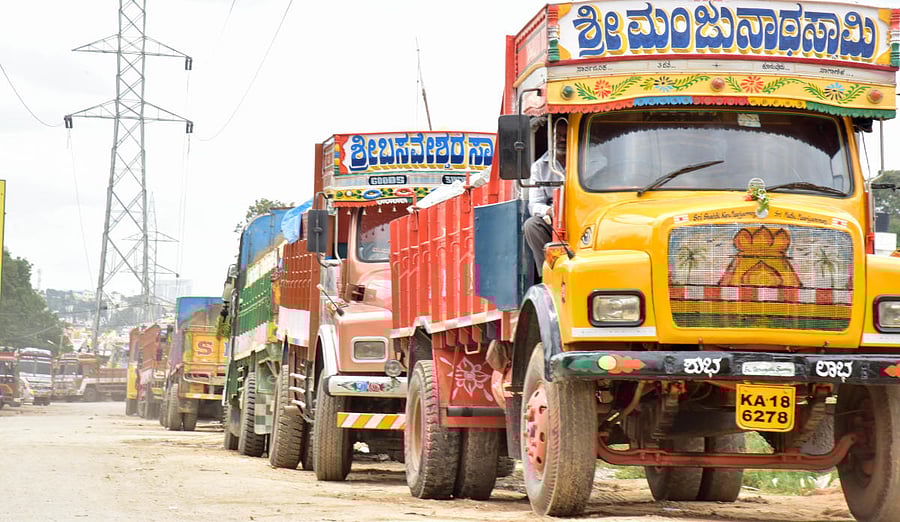 Truck drivers battle sleep deprivation, punishing schedules, poor health and bad roads to complete their trips on time. DH Photo B H Shivakumar