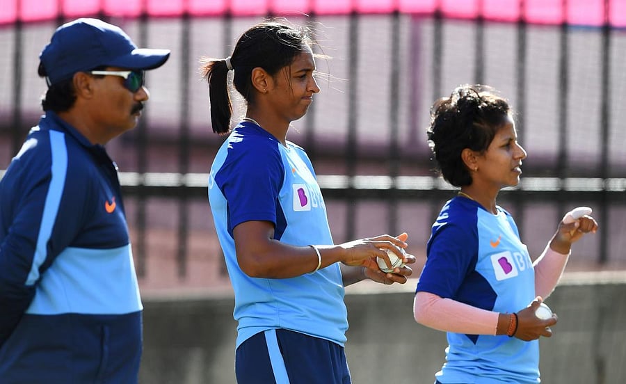 India's captain Harmanpreet Kaur (C) and Poonam Yadav (R) train in the nets ahead of the Twenty20 women's World Cup cricket final, in Melbourne on March 7, 2020. Credit: AFP Photo