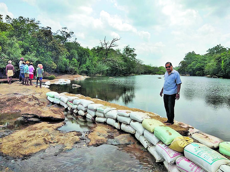 The Bund constructed with sand bags across River Seetha that flows at Handikallu in Hebri.