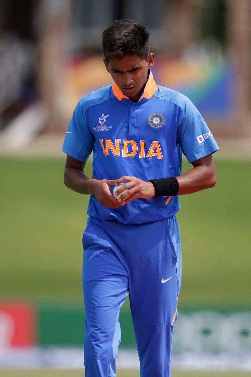 India's Kartik Tyagi prepares to deliver a ball during the Semi-Final of the ICC Under-19 Cricket World Cup between India and Pakistan at the Senwes Park in Potchefstroom on February 4. (AFP Photo)