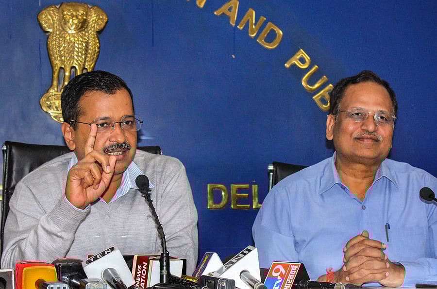 Delhi Chief Minister Arvind Kejriwal addresses a press conference after a state task force meeting in the wake of novel coronavirus scare, in New Delhi, Sunday, March 8, 2020. Delhi Health Minister Satyendar Jain is also seen. (PTI Photo)