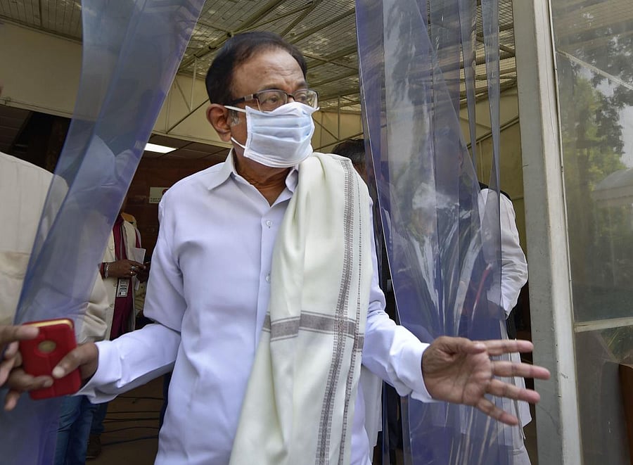  Senior Congress leader P Chidambaram wears a mask at Parliament, during the ongoing Budget Session, in New Delhi, Thursday, March 19, 2020. (PTI Photo)