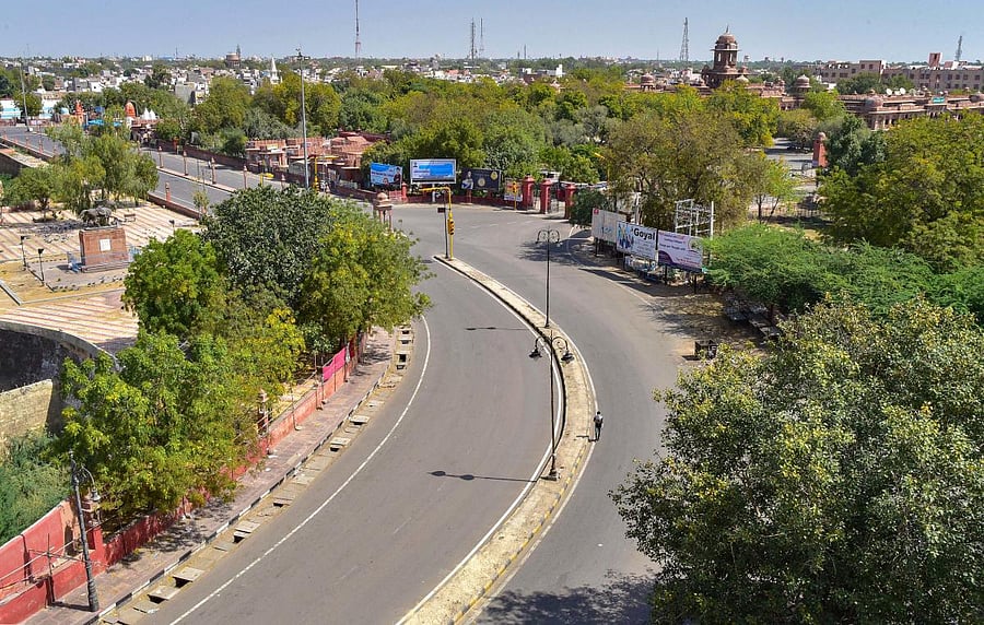 A city street wears a deserted look during 'Janata curfew' in the wake of coronavirus pandemic (PTI Photo)
