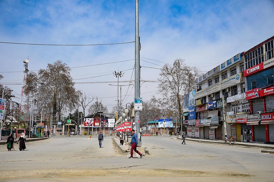 Police vehicles fitted with public address systems went around residential areas in the city and elsewhere in the valley early in the morning to announce that restrictions under CrPC Section 144, barring assembly of people, had been imposed.(PTI Photo)