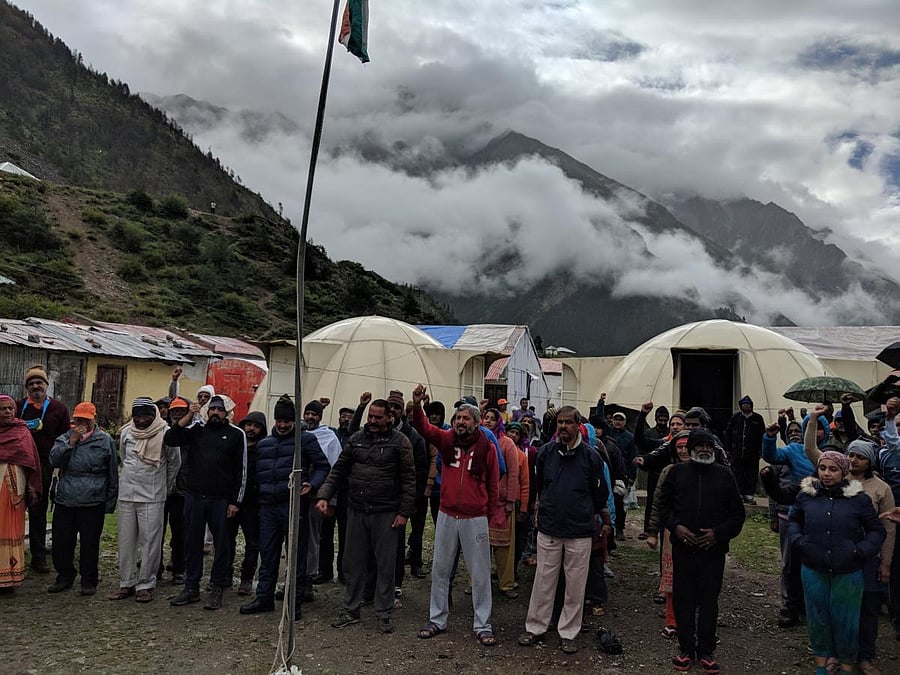 Yatris waiting at Gunji for the chopper lift.