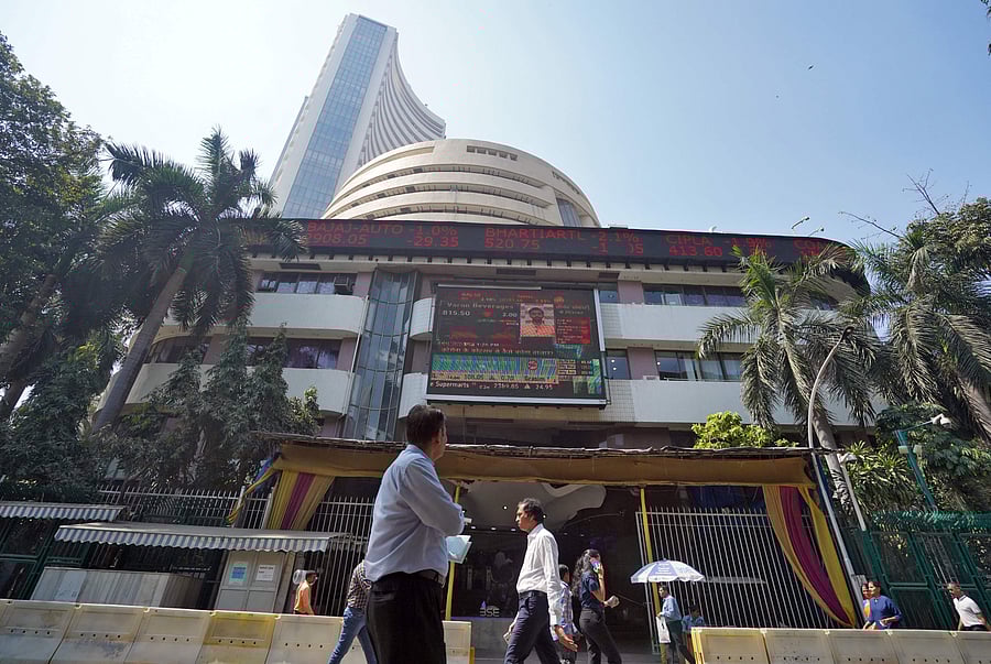 People walk past the Bombay Stock Exchange (BSE) building in Mumbai. (Credit: Reuters)
