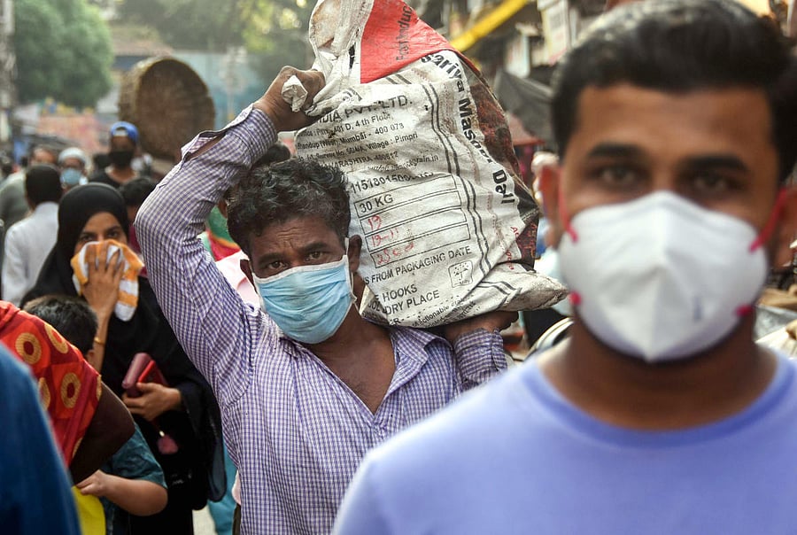 People at a market to buy essential items during day-2 of a nationwide lockdown, imposed in the wake of coronavirus pandemic (PTI Photo)
