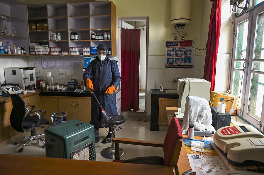  worker sanitises a hospital, during a nationwide lockdown imposed in the wake of coronavirus. PTI