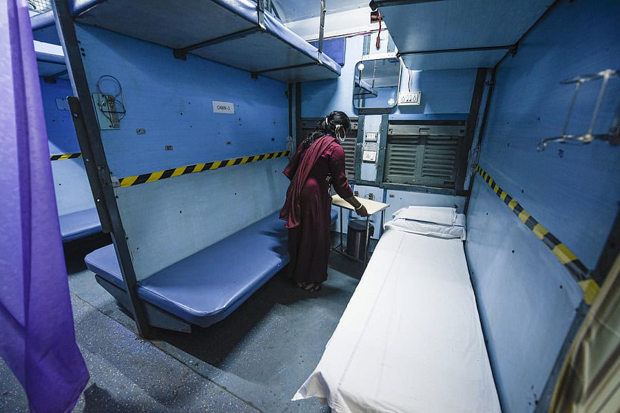  A worker prepares a train coach to be converted into isolation ward for COVID-19 patients, at Kamakhya Railway Station in Guwahati, Monday, March 30, 2020. (PTI Photo)