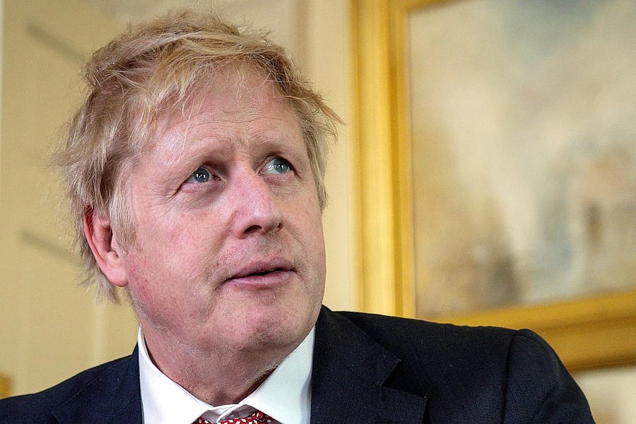 A handout image released by 10 Downing Street, shows Britain's Prime Minister Boris Johnson as he delivers a television address after returning to 10 Downing Street after being discharged from St Thomas' Hospital, in central London on April 12, 2020. Credit: AFP Photo