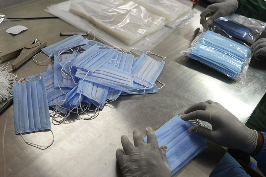 PErson making facemask (Image for representation/AFP Photo)