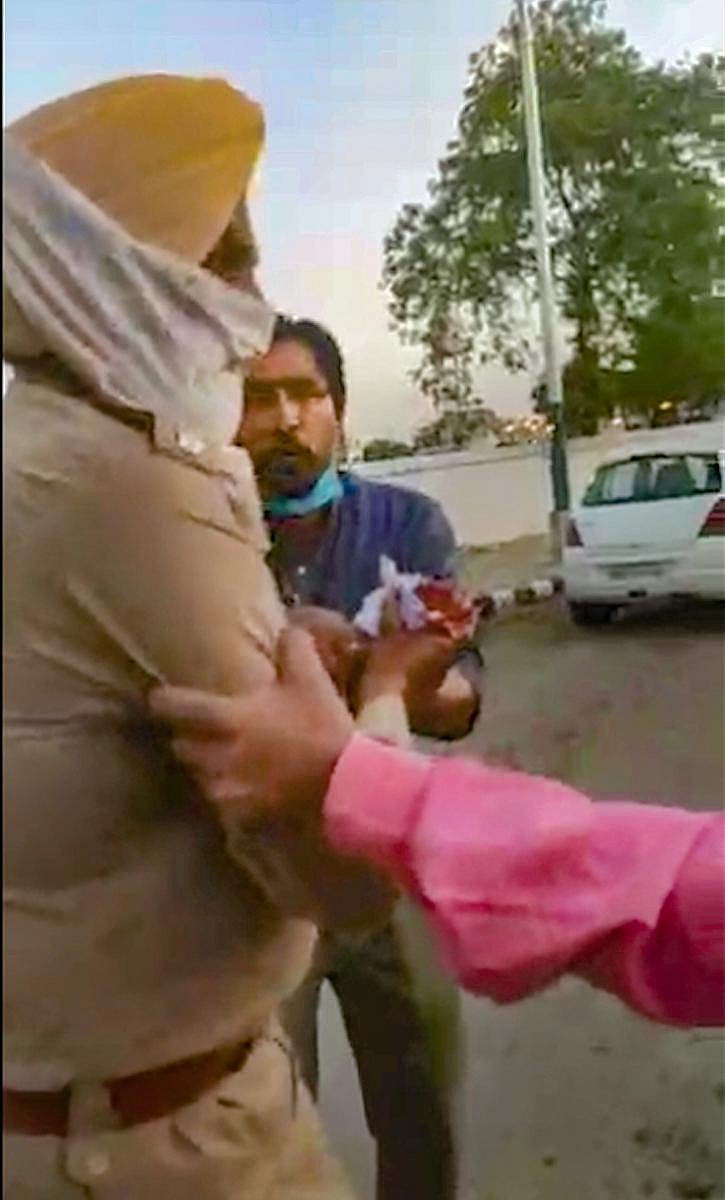 An inured policeman who was attacked by some Nihangs (PTI Photo)