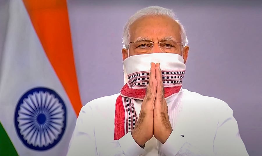 The PM's stole, also known as "Leiroom phee" is used mainly by men in Manipur. (PTI photo)