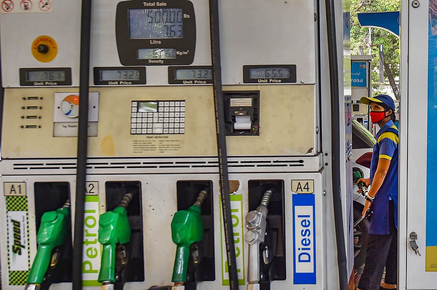 A woman on duty at a petrol pump during the nationwide lockdown imposed to contain the spread of COVID-19. (PTI Photo)