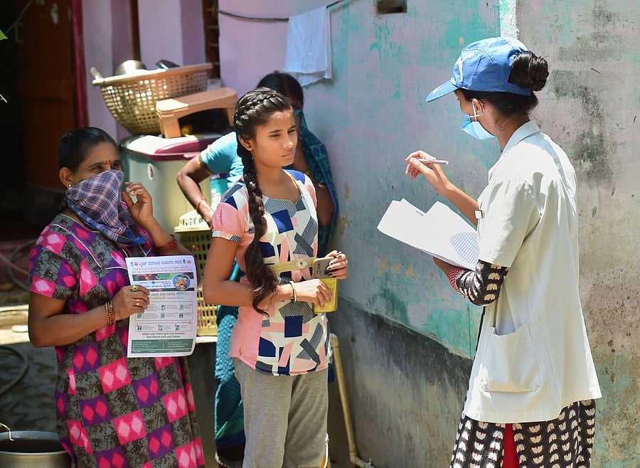 Health workers during a survery to detect COVID-19 patients during the nationwide lockdown imposed in the wake of coronavirus pandemic. (PTI Photo)