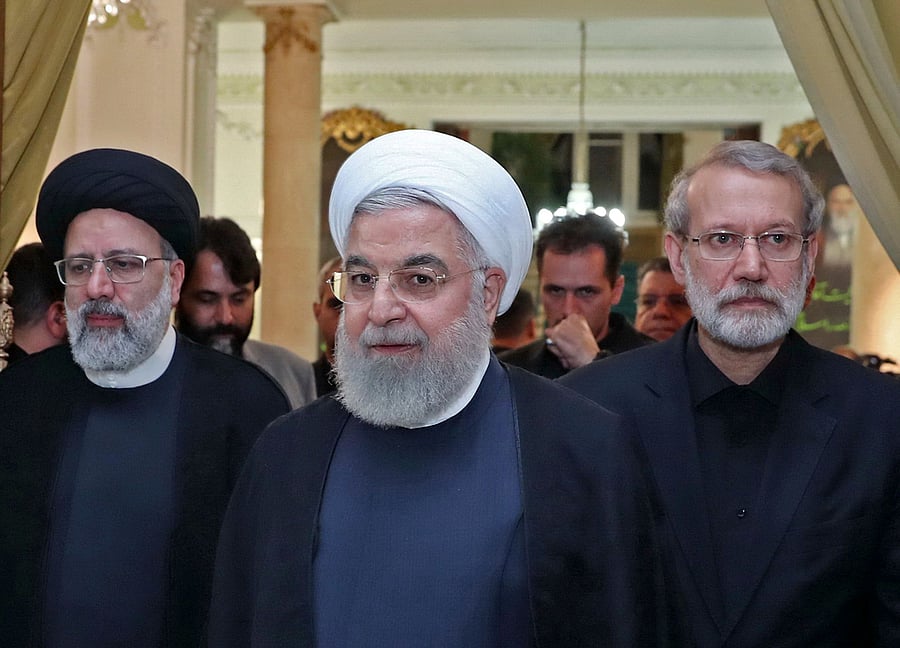 Iranian Judiciary chief Ebrahim Raisi (L) and parliament speaker Ali Larijani (R), in the capital Tehran. (AFP Photo)