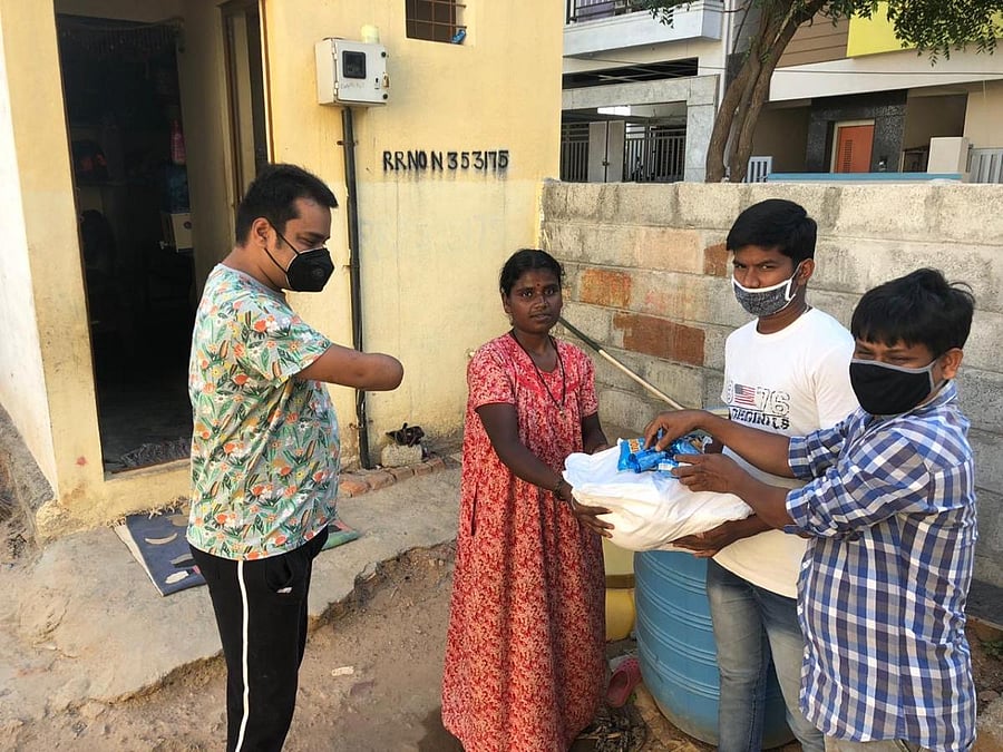 Shubhajith and Juli helping the needy