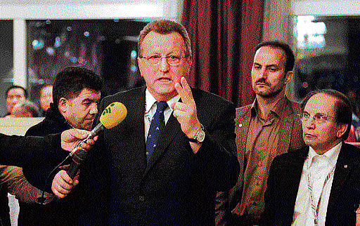 Rethink decision: Hegedus Csaba (centre) of Hungary, a senior member of FILA, addresses a meeting in Tehran on Wednesday to discuss last week's decision by the International Olympics Committee to drop wrestling from the programme of the 2020 Games. AFP