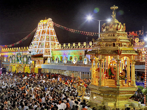 The Tirumala Tirupati Devasthanams (TTD) Executive Officer M G Gopal handed over 1,800 kg of gold deposits-belonging to the TTD-to State Bank of India (SBI) Chairperson Arundhati Bhattacharya in his chambers at TTD Administrative Building in Tirupati on Saturday. PTI photo