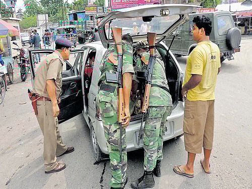 Set for final battle: Central force jawans check vehicles on the eve of the 6th and last phase of West Bengal Assembly  elections in Cooch Behar district on Wednesday. PTI