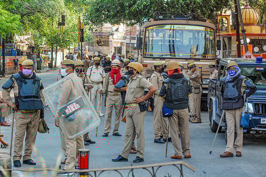 Heavy security deployment after locals allegedly pelted stones on a team of doctors and police officials, who had gone for a check-up of coronavirus suspects in one of the hotspot area, near Gulab Ghosi Masjid in Kanpur. (PTI Photo)