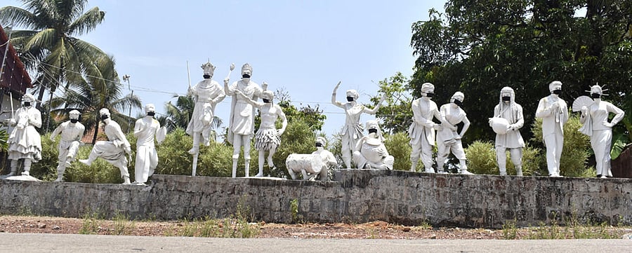 Sculptures with mask outside Kalaangann IN Shaktinagar.