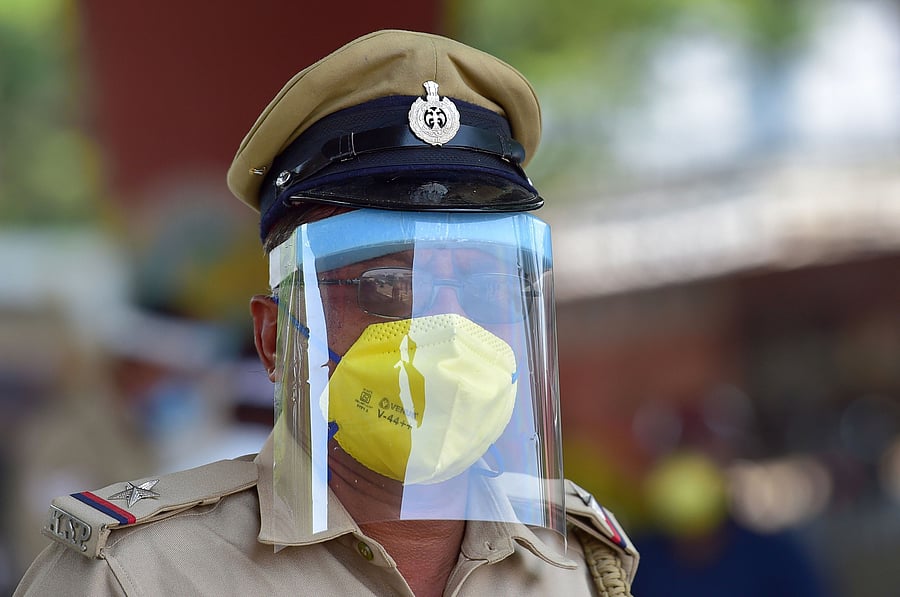 “Wearing a facial mask is compulsory in public places and any working space with more than five people,” the order said. (Credit: PTI Photo)