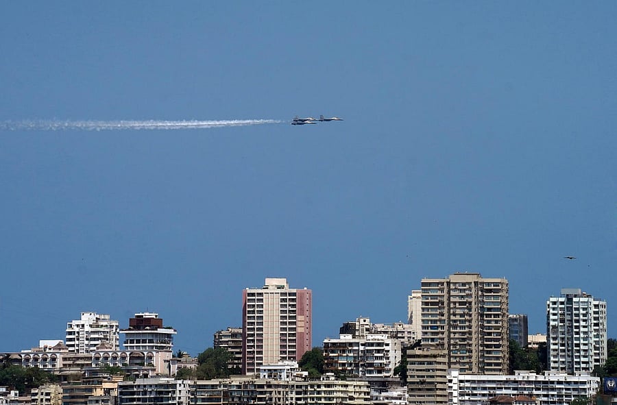 Indian Air Force (IAF) Sukhoi Su-30MKI fighter jets fly past Marine Drive as part of an event to show gratitude towards the frontline warriors fighting the coronavirus disease (COVID-19) outbreak, in Mumbai, India, May 3, 2020. REUTERS/Hemanshi Kamani