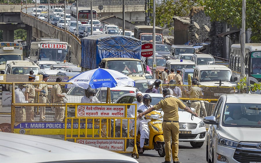 A 21-day nationwide lockdown that Prime Minister Narendra Modi declared in late March to fight the epidemic is officially set to end on April 14. (Credit: PTI Photo)