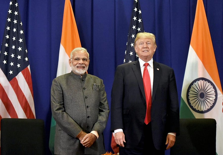 Manila: Prime Minister Narendra Modi meeting the President of United States of America (USA), Donald Trump in Manila, Philippines on Monday. PTI Photo / PIB (PTI11_13_2017_000086A)